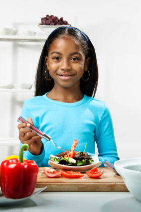 Child making Salad